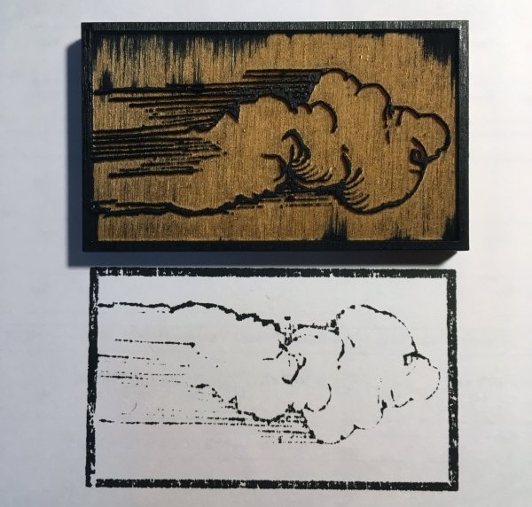 A laser-cut woodblock of Dürer’s cloud and a print created from it