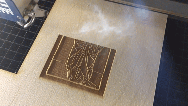 Wood being cut on a 60 Watt Epilog Fusion laser cutter