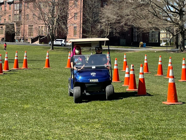 Students taking part in a drunk driving simulation workshop