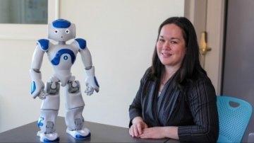 Heather Pon-Barry and robot