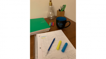 A notebook open on a student desk
