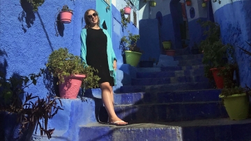 Maddie Fitzgerald ’21 standing on some blue steps in Morocco
