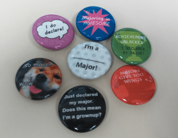 Buttons with sayings on them about selecting a major, such as "I do declare" and "I just declared my major! Does that mean I'm a grown up?"
