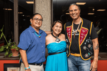 Zowie Banteah ’95 (center) with her family and Larry Spotted Crow Mann (far right).