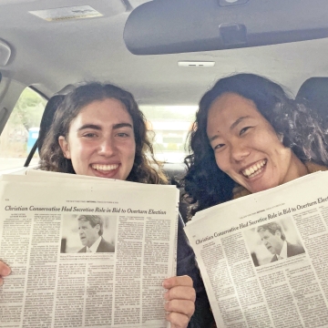 Elena Frogameni ’22 and Chisato Kimura ’22 happily displaying the New York Times article that featured their research