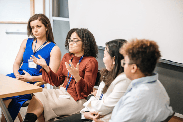 A panel of students having a discussion with the audience during LEAP