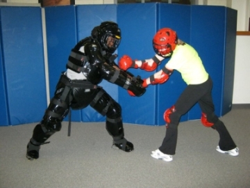 A student and instructor during a self defense workshop