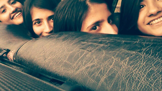 The Abbasi sisters on a bus in Pakistan: Eeman, Ammal, Ahlaam and Minnal. They are all interested in various aspects of computer science and biology.