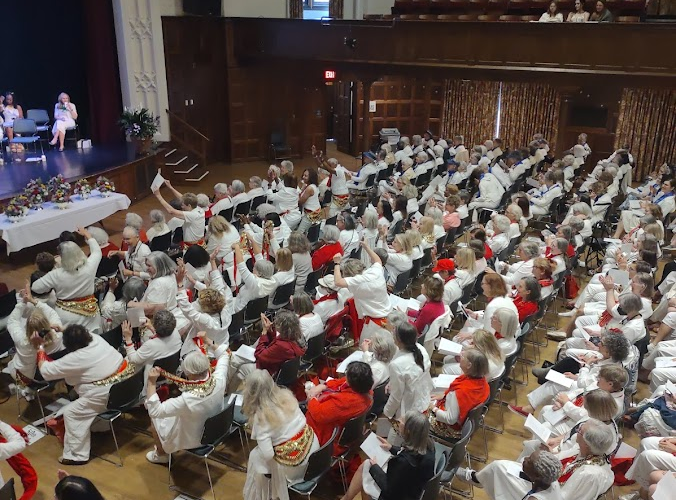 Alums seated in Chapin Auditorium for the annual meeting at Mount Holyoke College.