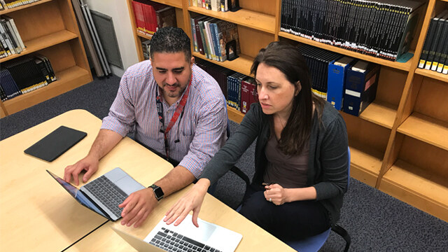 Mount Holyoke’s Ruth Hornsby, assistant director of grad programs, and grad student Julio Hernandez MAT’20 discuss the requirements for the master’s in teaching degree.