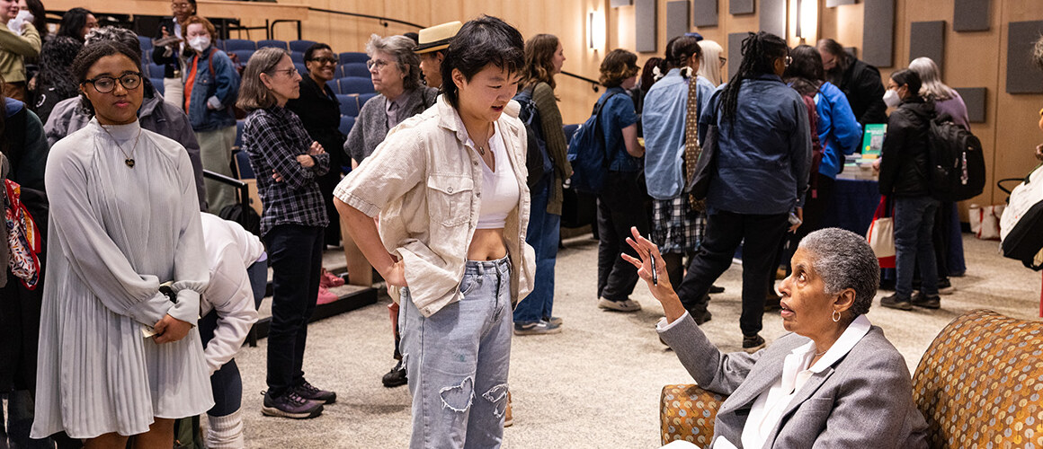 Barbara Smith ’69, speaks with a student