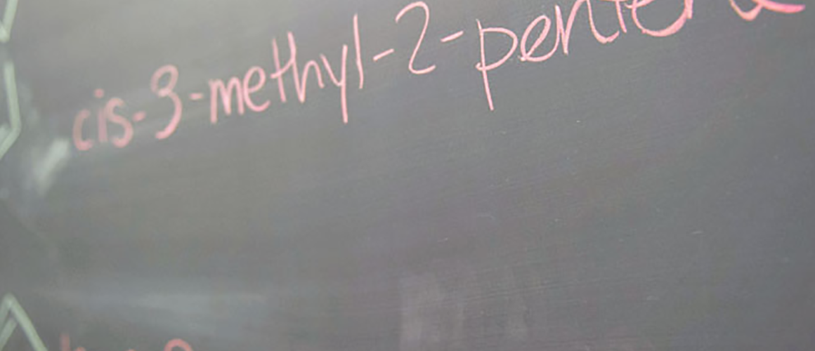 Chemistry terms written on a chalkboard