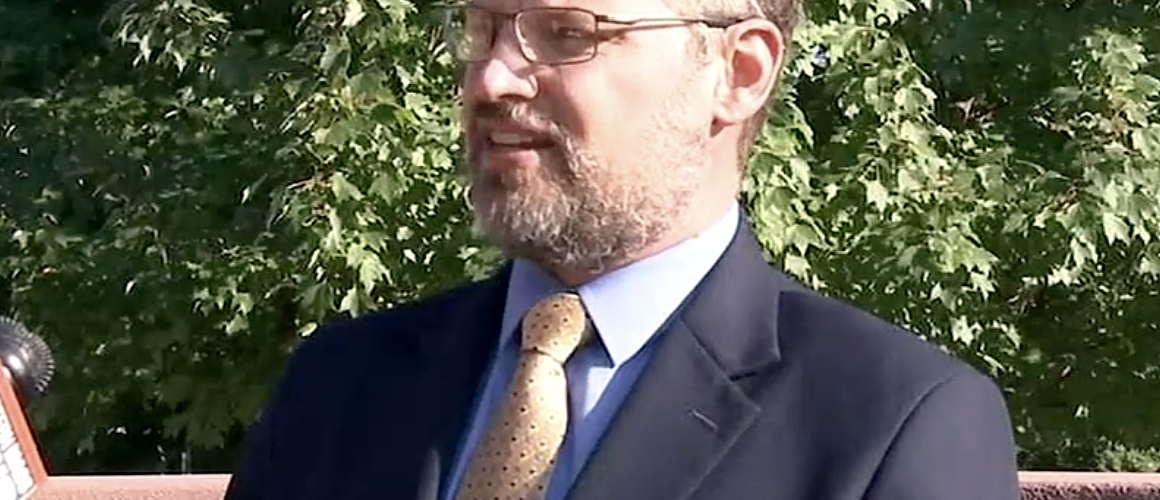 Christopher Mitchell speaking with a Western Mass News reporter