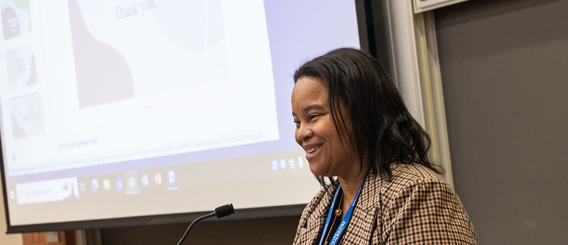 Danielle Holley in a classroom with a screen behind her. Photo by Joanna Chapman.