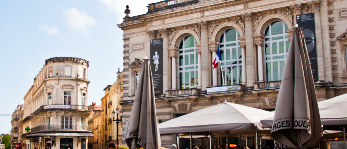 Downtown Montpellier, France with people seated at an open air cafe