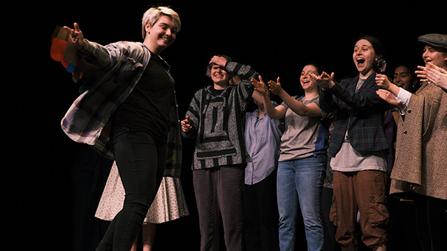 Junior show of 2022 featuring Jorge the Goose; Group of students with smiles and incredulous looks on their faces.