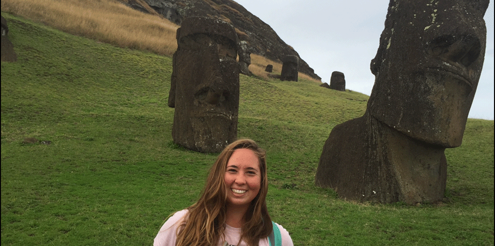 Julia Godinez with monumental statues on Easter Island / Rapa Nui.