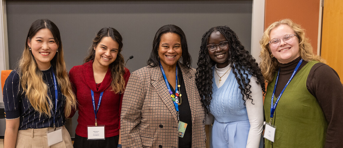 Students who presented at the LEAP Symposium pose for a photo with President Danielle R. Holley