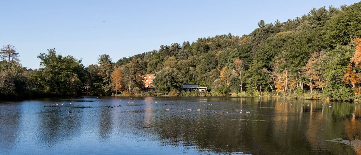 Lower Lake on campus in early fall, with the leaves just starting to turn