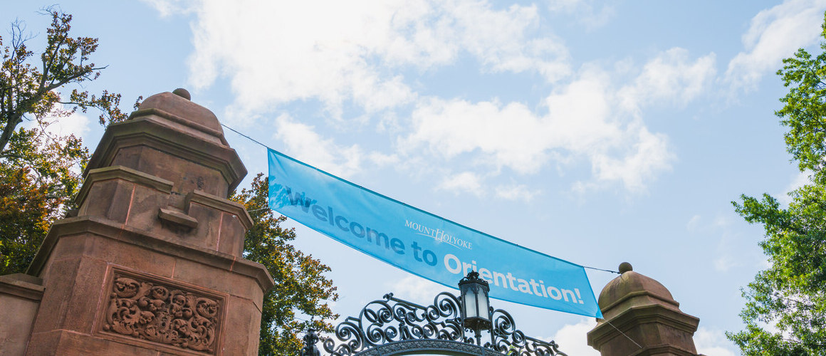 Welcome to Orientation sign above the gates at Mount Holyoke College.