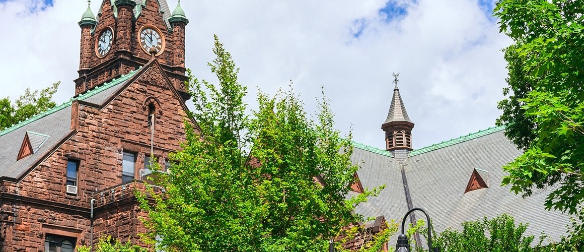 Clocktower in the Mary Lyon building on Mount Holyoke College's campus. Photo taken by Max Wilhelm, summer 2024.