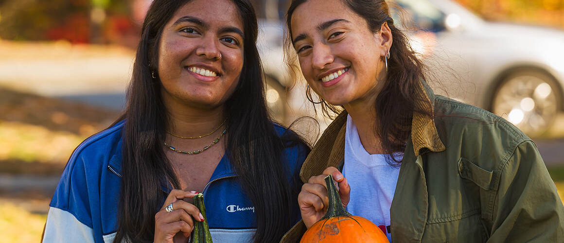 Students/Friends holding pumpkins at Mount Holyoke College Fall Fest