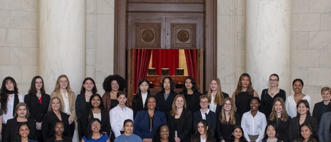 Supreme Court Justice Ketanji Brown Jackson (seated, center) with Mount Holyoke College students, faculty, staff and President Danielle Holley.