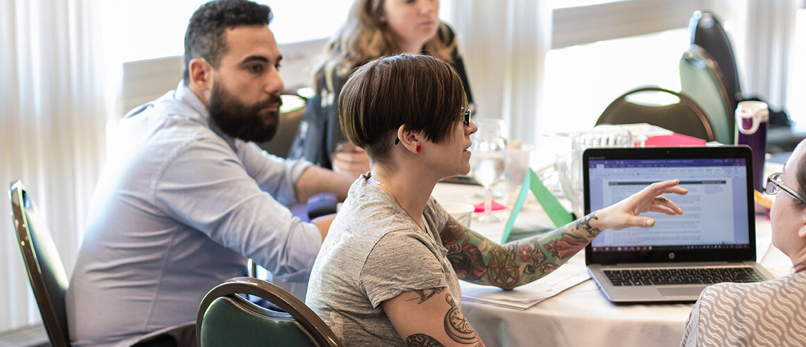 Professional and Graduate students in a discussion.