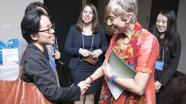 Kavita Ramdas ’85 greets Mount Holyoke College students.