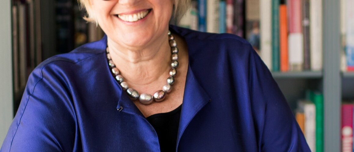Sonya Stephens standing in front of a bookcase