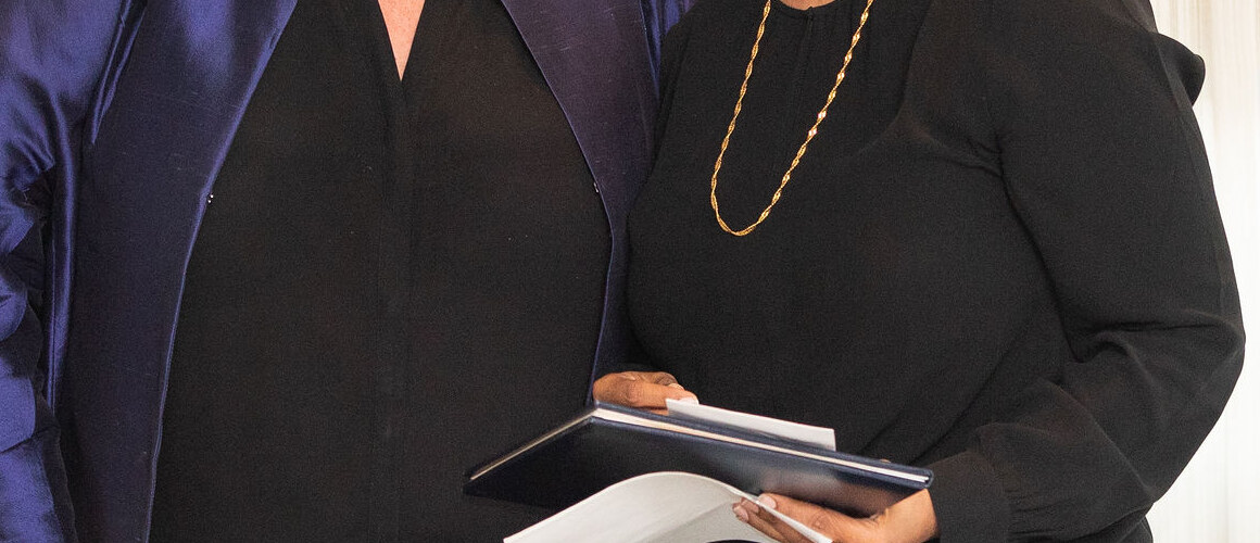 Suparna Roychoudhury (right), associate professor of English, accepted the Meribeth E. Cameron Faculty Award for scholarship from President Sonya Stephens in 2020.