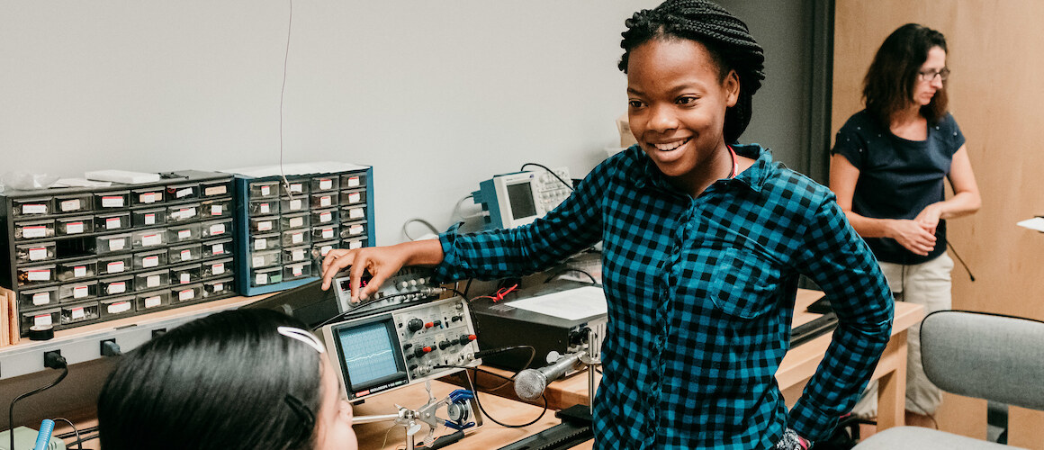 Students using sound testing equipment