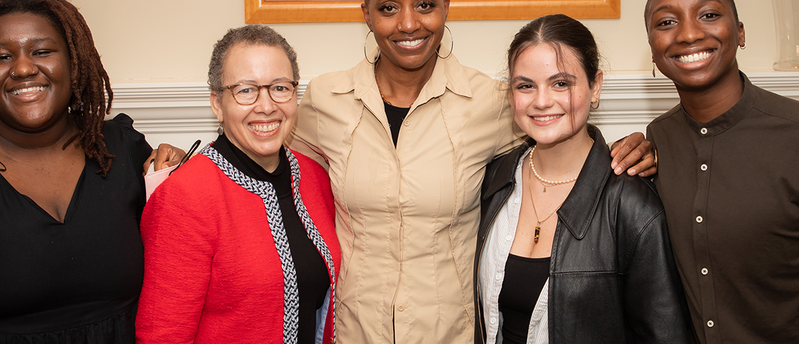 Tara Roberts ’91 (center) with Interim President Beverly Daniel Tatum and current MHC students