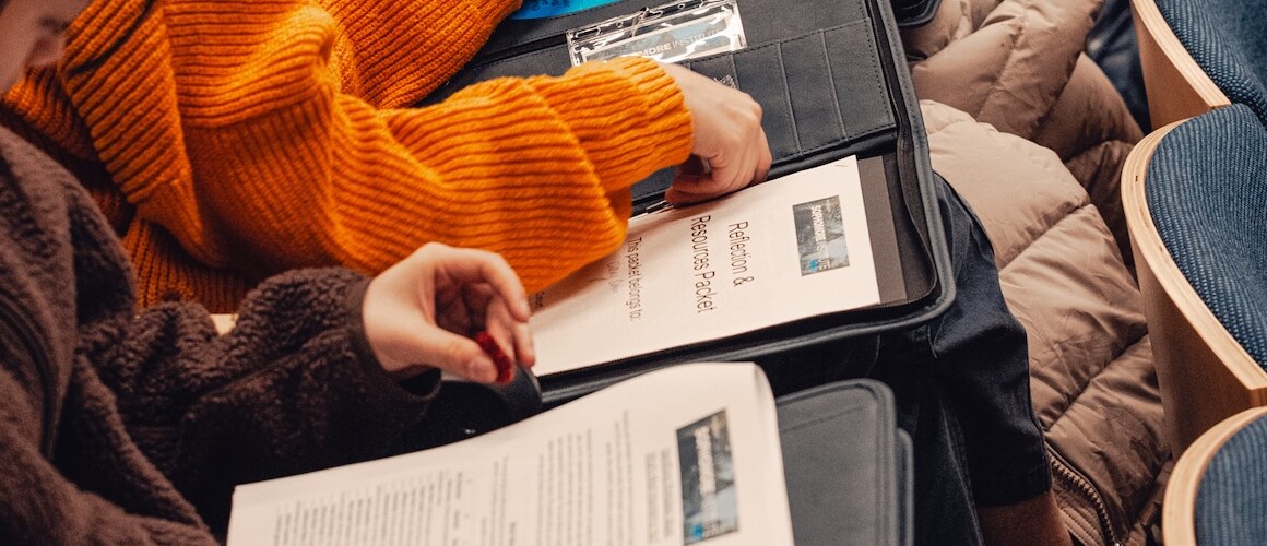 2026 Sophomore Institute students reading papers