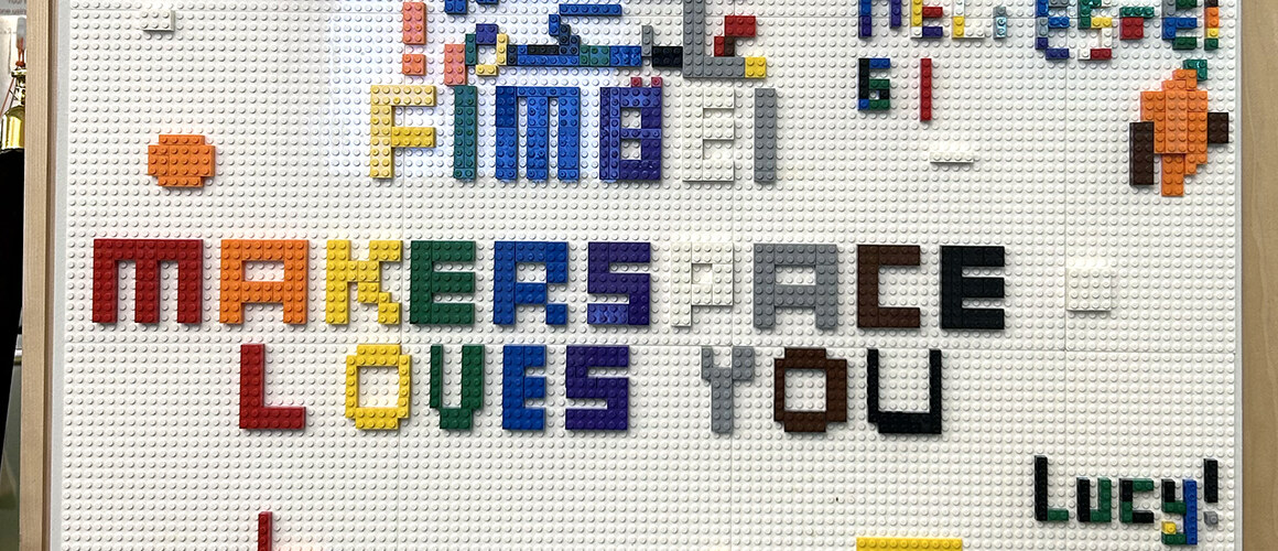 The words Fimbel Makerspace Loves you written with Legos
