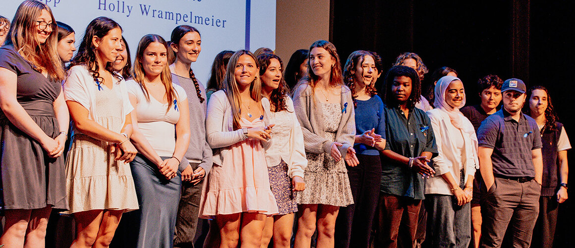 2026 Leadership and Service award winners on stage.